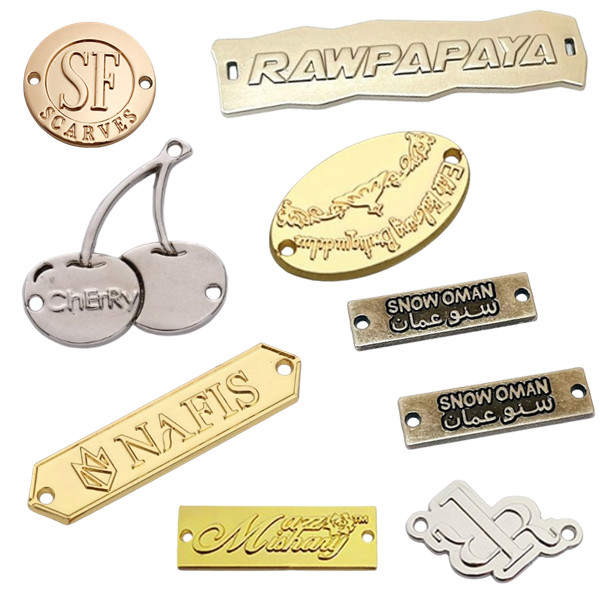 Embossed metal tags for clothing