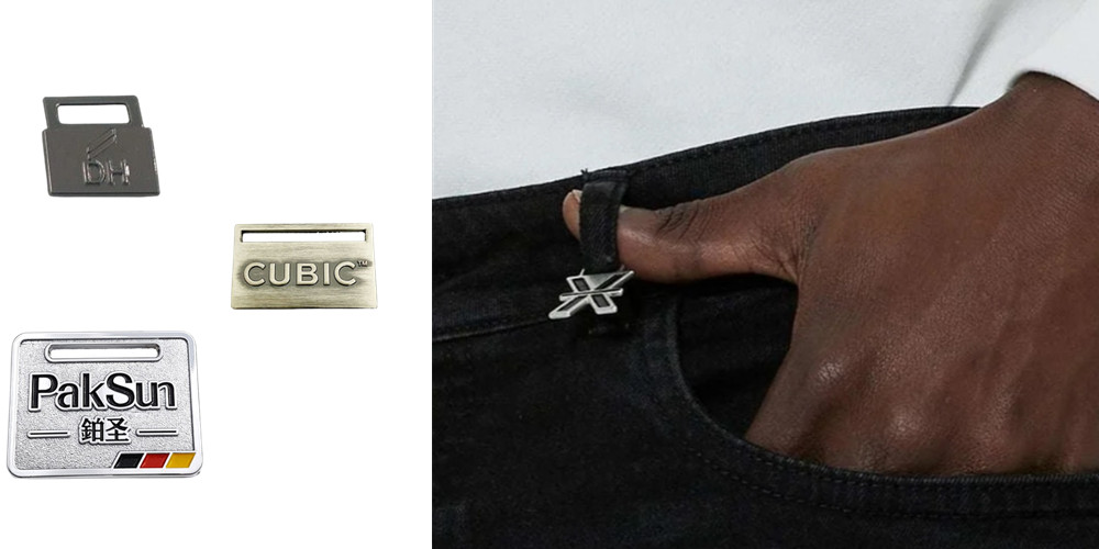 custom metal tags hang on jean's belt loop